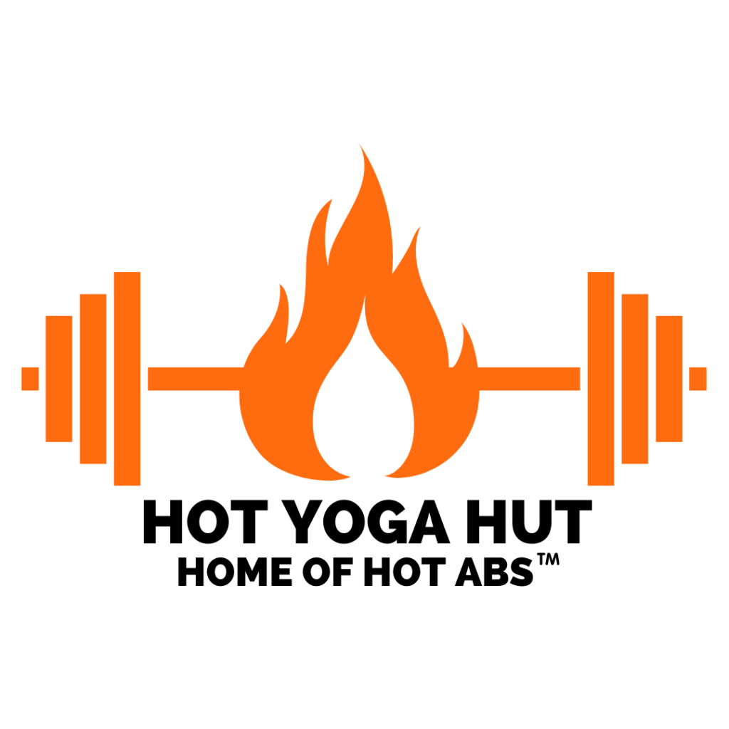 Silhouette of a person meditating in lotus pose against teal background.