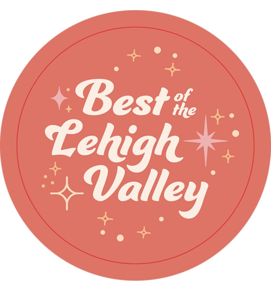 Silhouette of a person meditating in lotus pose against teal background.